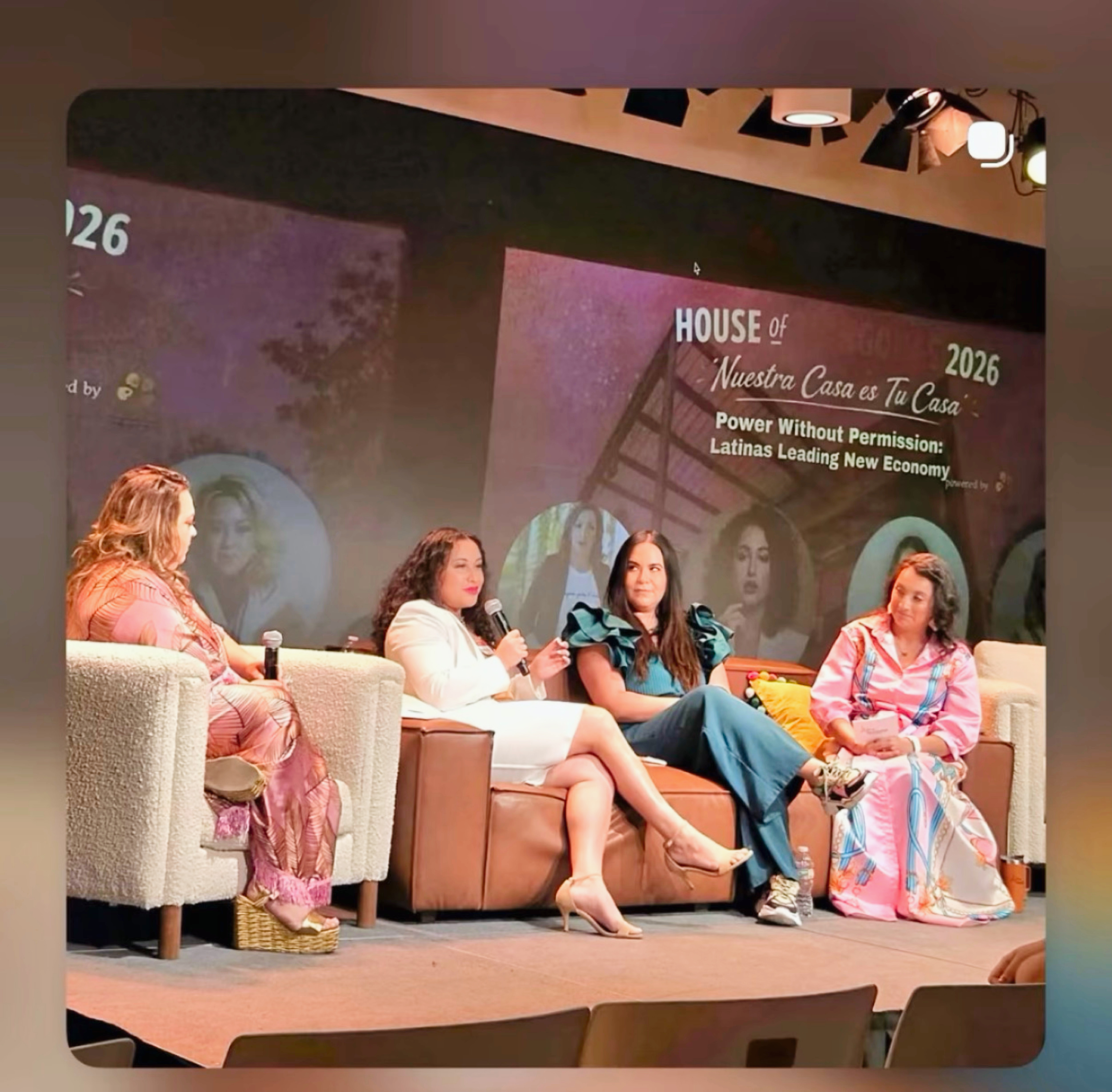 Angelica Robles on a panel, wide stage view